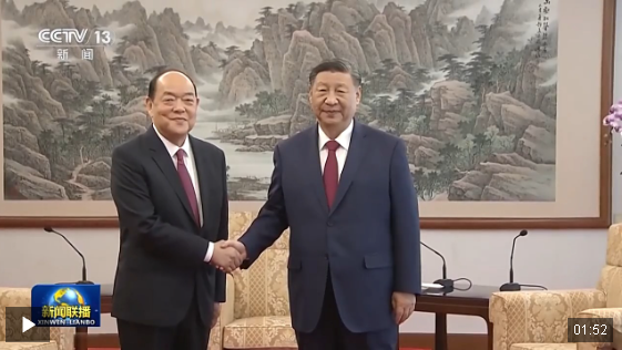 習近平會見賀一誠